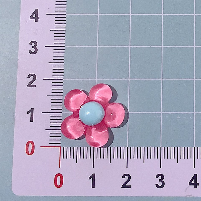 Nuevos accesorios de resina de cinco pétalos de hielo DIY crema pegamento para el cabello con cáscara de teléfono móvil agujero agujero de botón de zapato taza de agua pegatinas hechas a mano