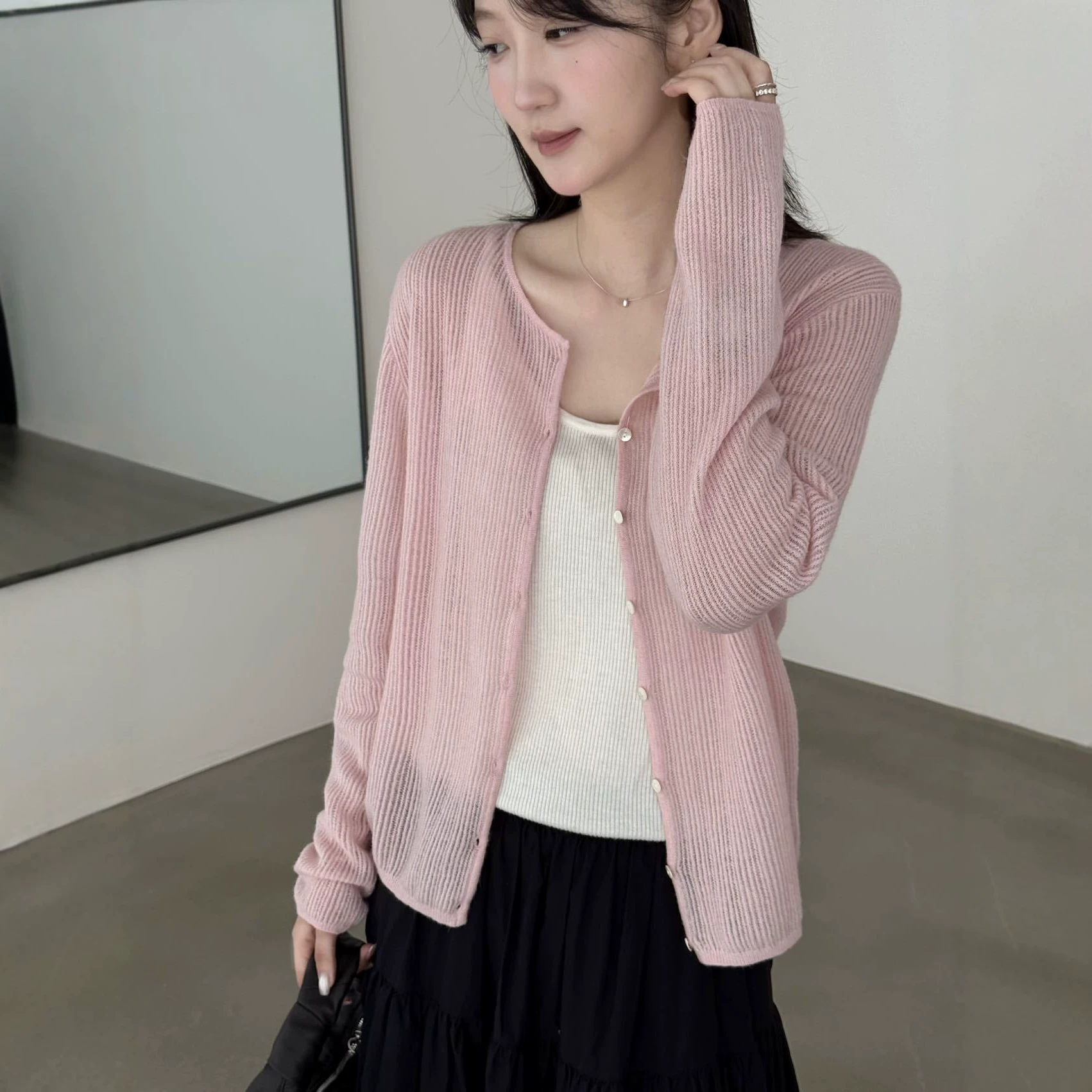 Korean style alpaca wool round neck long-sleeved striped knit cardigan for women, new autumn 2026, loose fit, versatile, suitable for commuting.