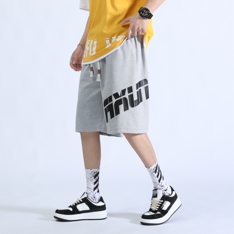 Pantalones cortos para niños verano 2025 nuevo suelto elástico de punto de moda pantalones deportivos juveniles de cinco puntos pantalones micro-elásticos