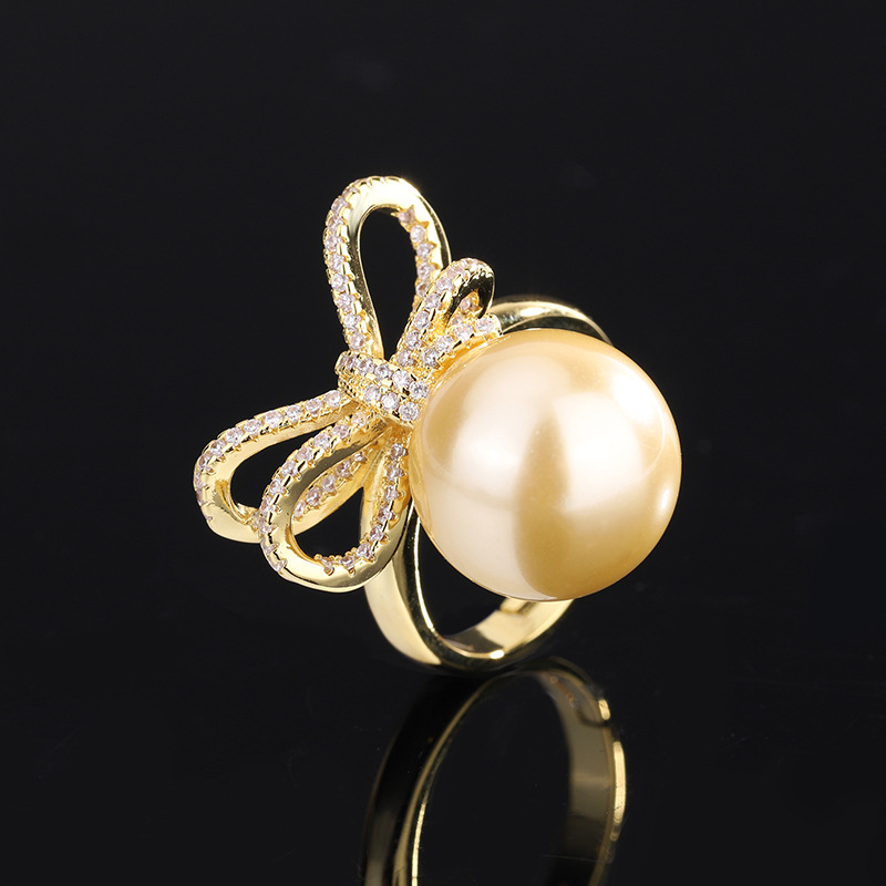 Zhuang Sheng joyería cobre inferior chapado en oro nuevo incrustaciones de oro ligero rebordear estilo coreano arco diamante traje femenino 14mm