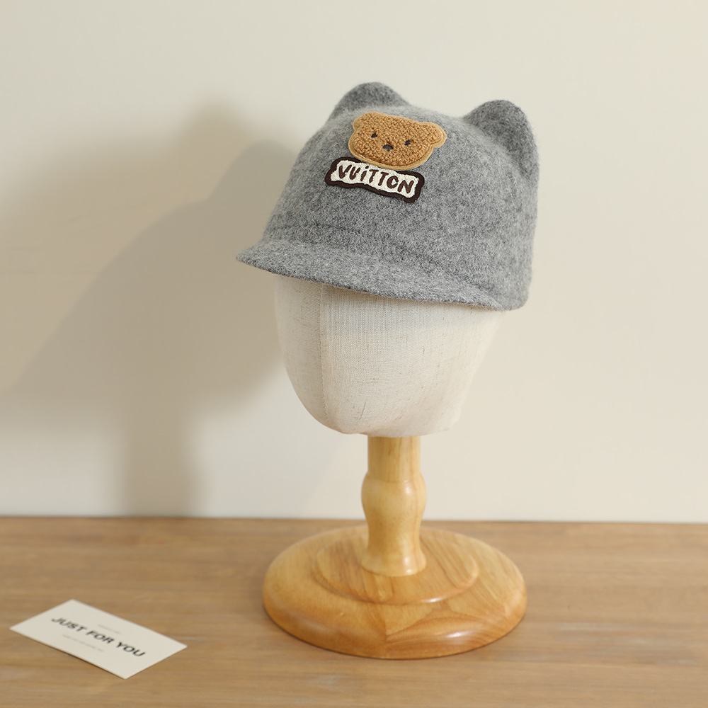 La nueva gorra de orejas de oso lindo y súper lindo niño coreano bebé masculino y femenino otoño e invierno cálido sombrero de copa de lana