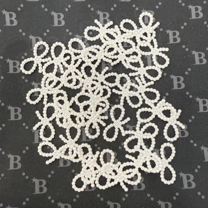 米白色塑料蝴蝶结挂坠