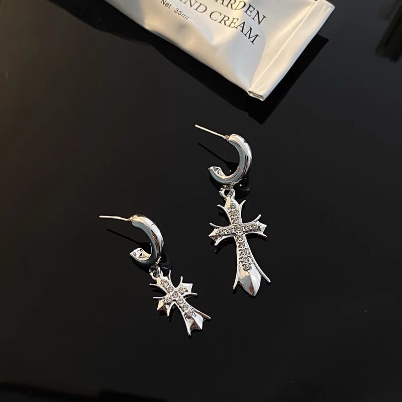 Pendientes cruzados con aguja de plata y diamantes AB Diseño de nicho Pendientes de viento frío Moda europea y americana Pendientes de alta gama Mujeres