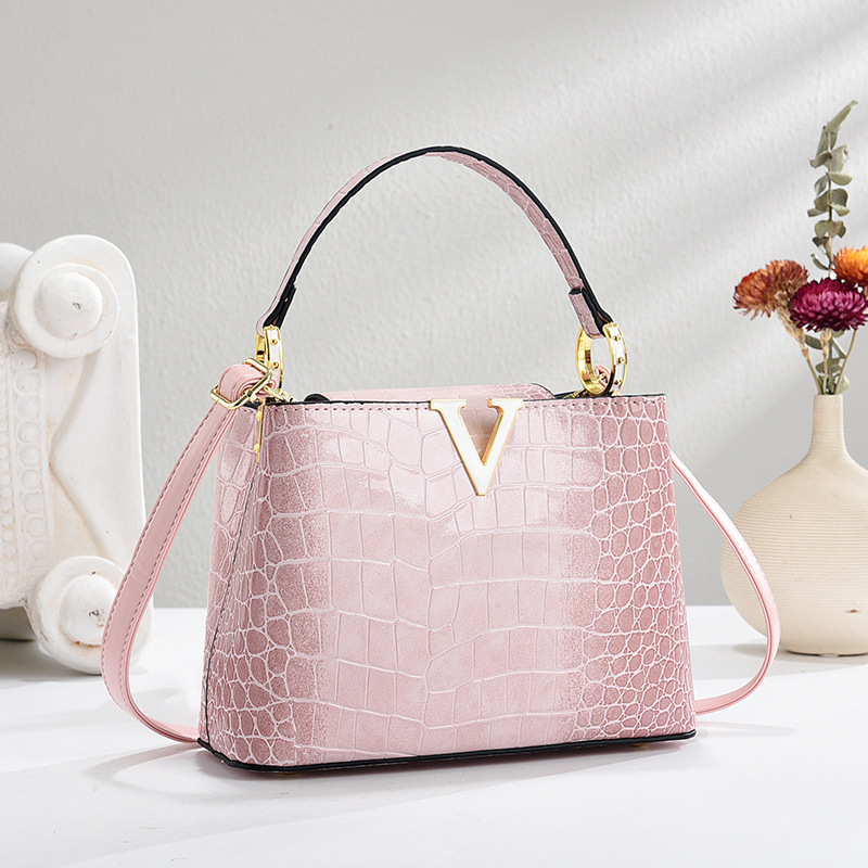 Patrón de cocodrilo de charol 2025 nuevo bolso de moda bolso de cubo de mediana edad bolso de mensajero de hombro para mujer madre degradada