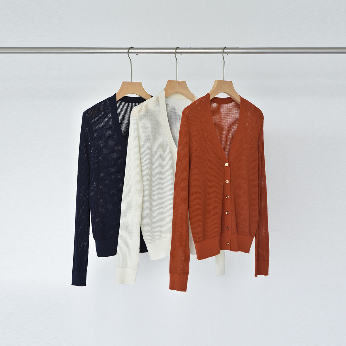 2025秋季新款韩国风V领纯羊毛薄款纯色针织镂空长袖开衫LP女上衣