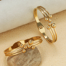 欧美跨境个性镀金手镯夸张手环女式复古圆珠弹簧开口钛钢手饰饰品