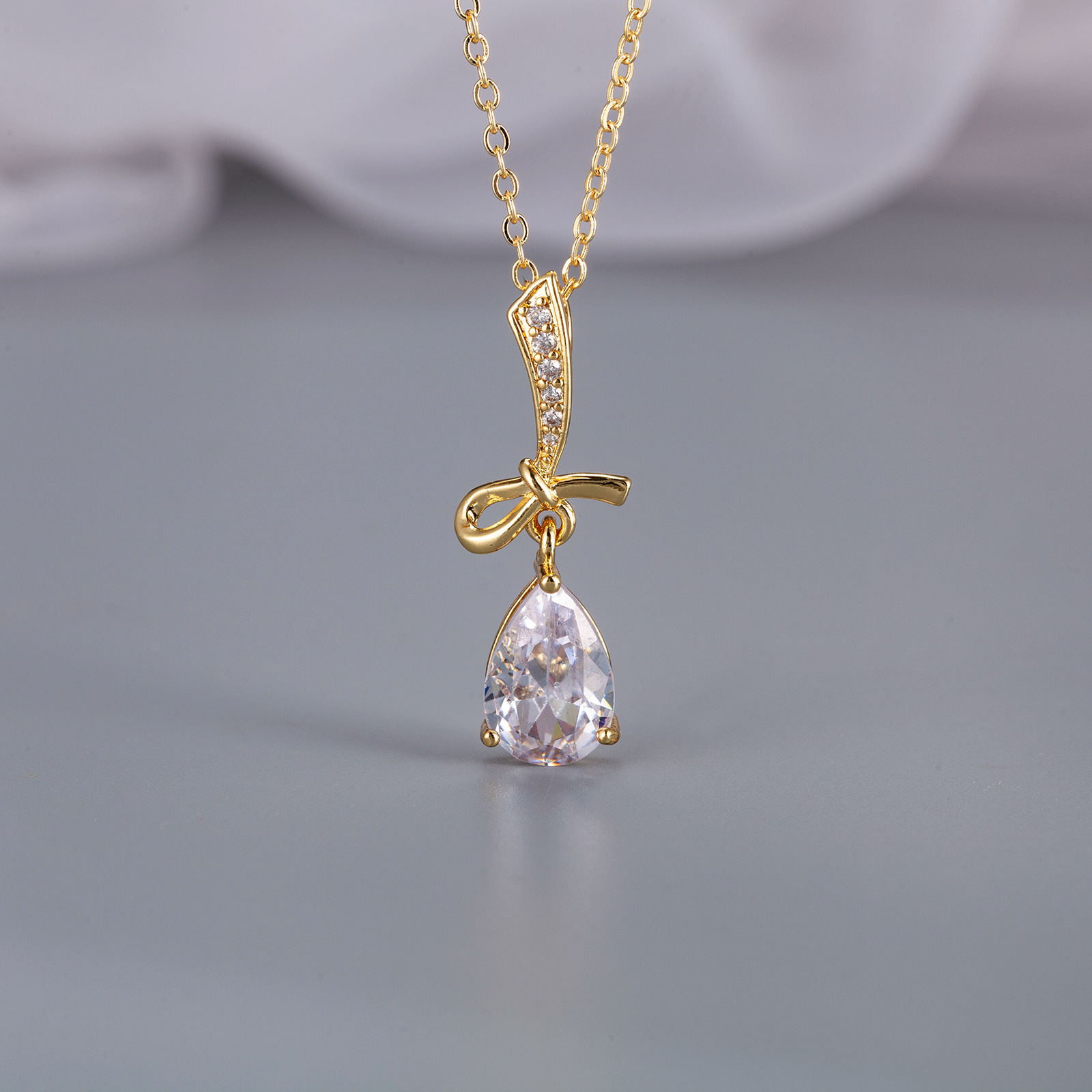 Brand pendant with zircon