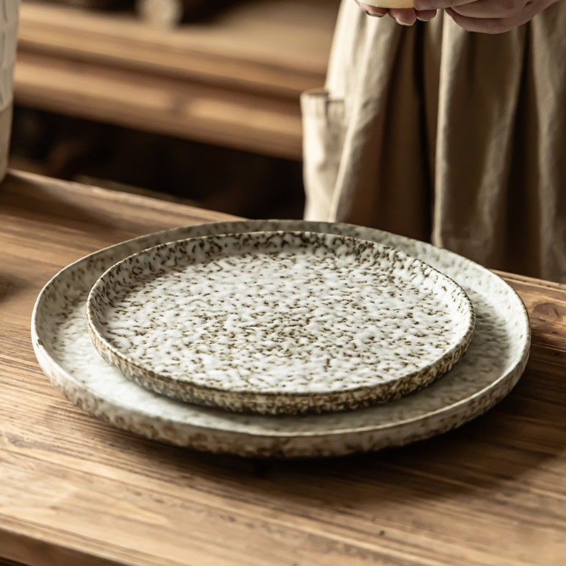 Plato de cerámica de piedra antigua sensación de estilo japonés plato circular platos de platos de cubierta platos de carne al por mayor platos de platos de comedor