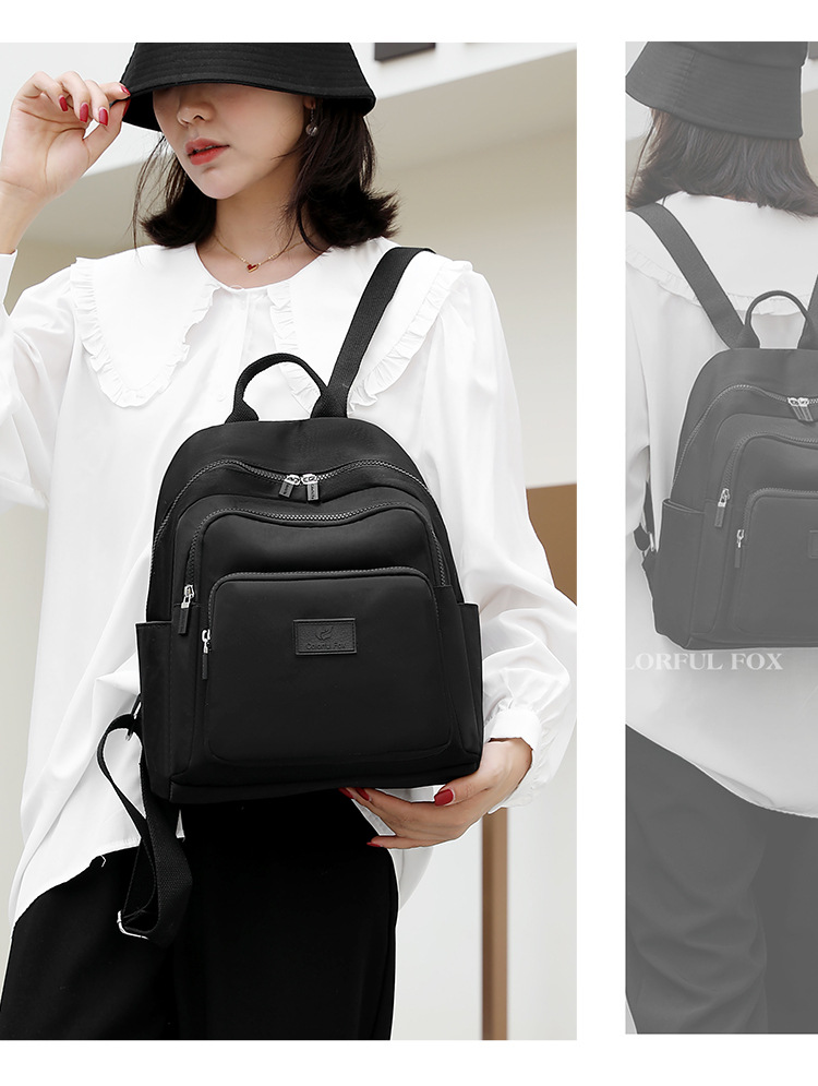 Colorful Fox's new backpack, a large-capacity casual backpack for women, is water-resistant and multi-layered for travel students undefined
