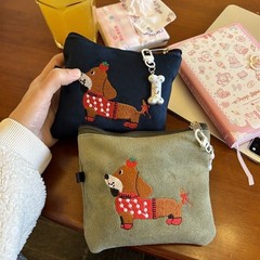 かわいいスエードのソーセージの犬のカードの収納袋は外出して携帯して携帯してイヤホンの口紅のおばさんのタオルの収納袋を包みます。