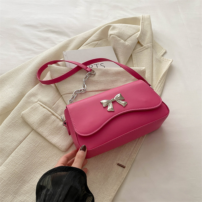 Este año popular bolso de arco para mujeres 2024 nuevo estilo extranjero primavera y verano mini bolso de cadena bolso de mochila