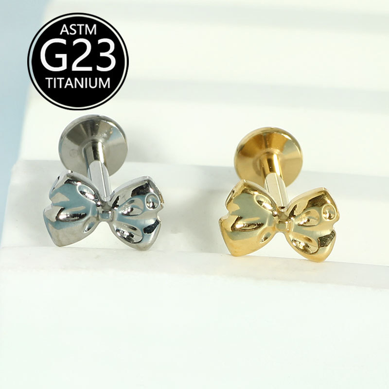 Silver pointed spike labret stud material detail