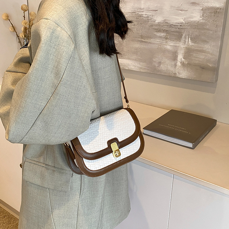 Diseño ligero de nicho de lujo tejido bolso cuadrado estilo extranjero estilo coreano universal de viaje diario de oficina mochila de hombro