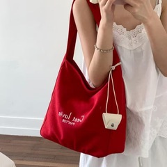 超火红色帆布包女2025新款大容量ins韩风上班通勤学生单肩托特包