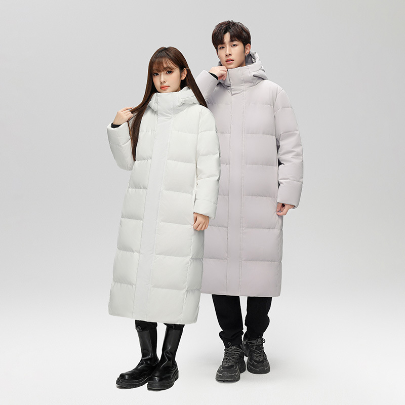 Chaqueta de plumón para hombres y mujeres mediana y larga en invierno de 2025 nuevos productos sobre la rodilla alargada y gruesa tendencia de chaqueta de hombre