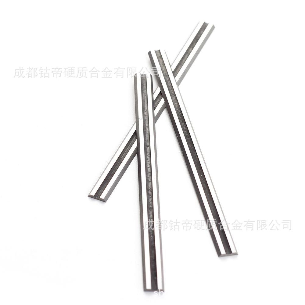 Cuchillas de cepillado eléctrico TCT transfronterizas 82x5.5x1.1-35 ° AliExpress Europa y América de acero de tungsteno universal 82 reemplazo de mano