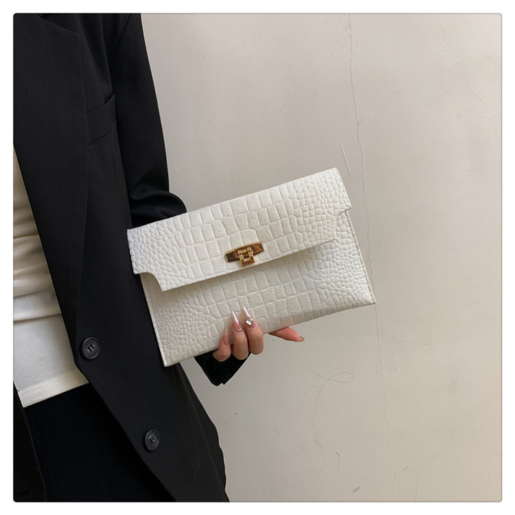 Personalizado todo-fósforo de la manera simple fieltro patrón de piedra bolsa bolso de las mujeres 2023 invierno nuevo sobre bolsa de embrague