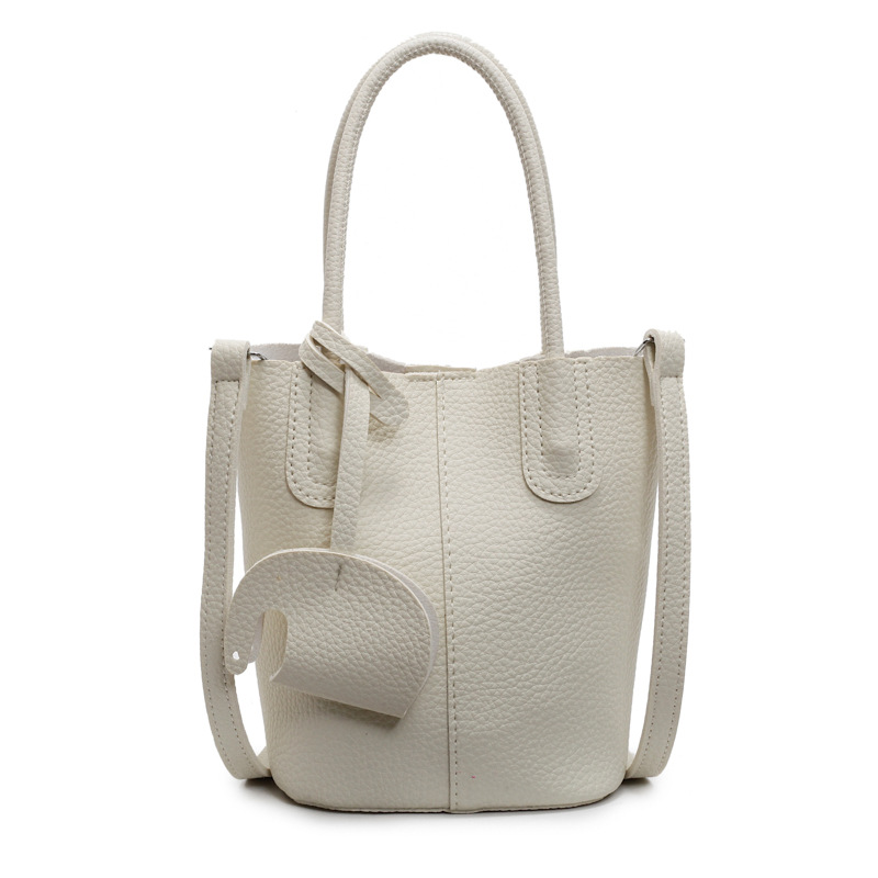 Bolso de cubo de venta caliente de comercio exterior, sentido de alta gama de nicho femenino 2025 nuevo bolso de mano simple y versátil, bolso de mensajero de moda y versátil