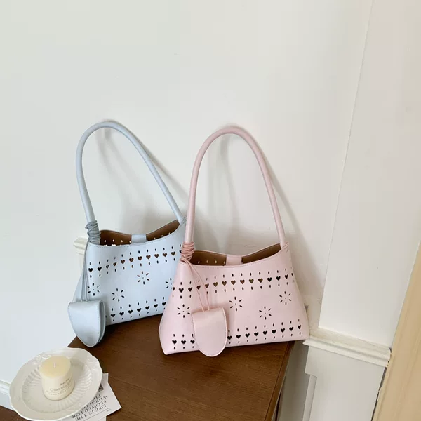 Korean Niche Hollow-Out Design Underarm Dumpling Bag for Women, New Light Luxury Versatile Shoulder Bag, Casual Commuter Women's Bag