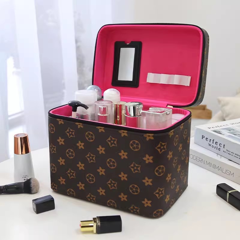 Bolsas de maquillaje europeas y estadounidenses transfronterizas de gran capacidad de alta calidad caja de maquillaje portátil de tres piezas conjuntos de exportación de caja de almacenamiento de cosméticos en línea