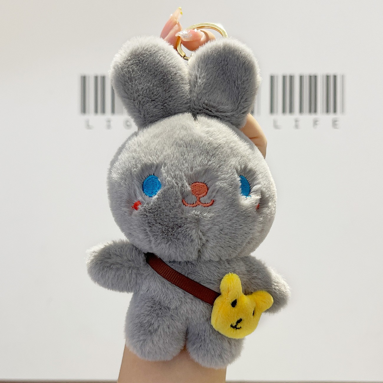 Cuatro pulgadas muñeca máquina colgante felpa llavero lindo muñeca mochila adornos grab máquina muñeca regalo al por mayor