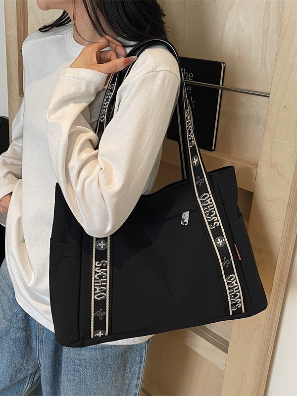 Bolso Tote portátil horizontal de tela de nailon para mujer 2025 nueva moda casual todo fósforo bolso de hombro de trabajo