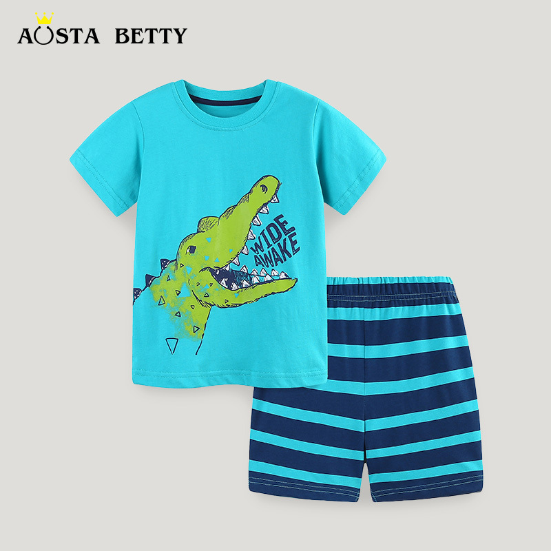 Suministro transfronterizo de ropa infantil europea y americana al por mayor, trajes de verano para niños, conjunto de dos piezas con estampado de cocodrilo de dibujos animados, cuello redondo y pantalones cortos.