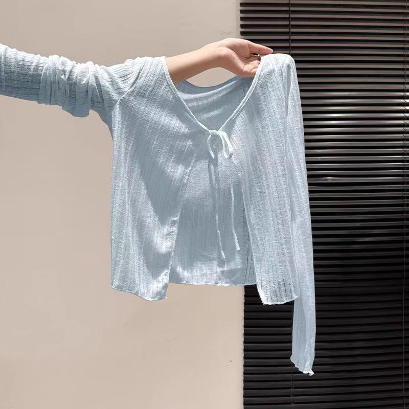 Light blue lace-up thin knit cardigan for women, new spring style, loose-fitting, sun-protective, long-sleeved outerwear Light blue lace-up thin knit cardigan for women, new spring style, loose-fitting, sun-protective, long-sleeved outerwear