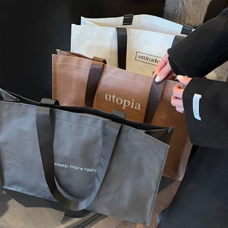 高档服装店编织袋女装衣服包装打包大容量购物带手提白色袋子定制