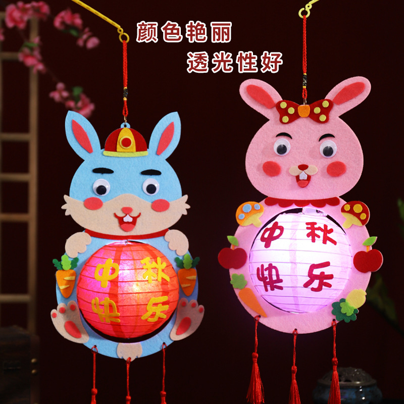 Festival del Medio Otoño Linterna niños de dibujos animados luminosos hechos a mano paquete de material de bricolaje linterna portátil jardín de infantes bailando Linterna