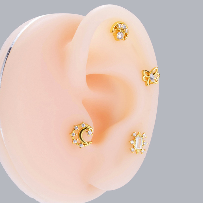 Orecchini a vite con zircone pentagramma farfalla e luna_voghion.com