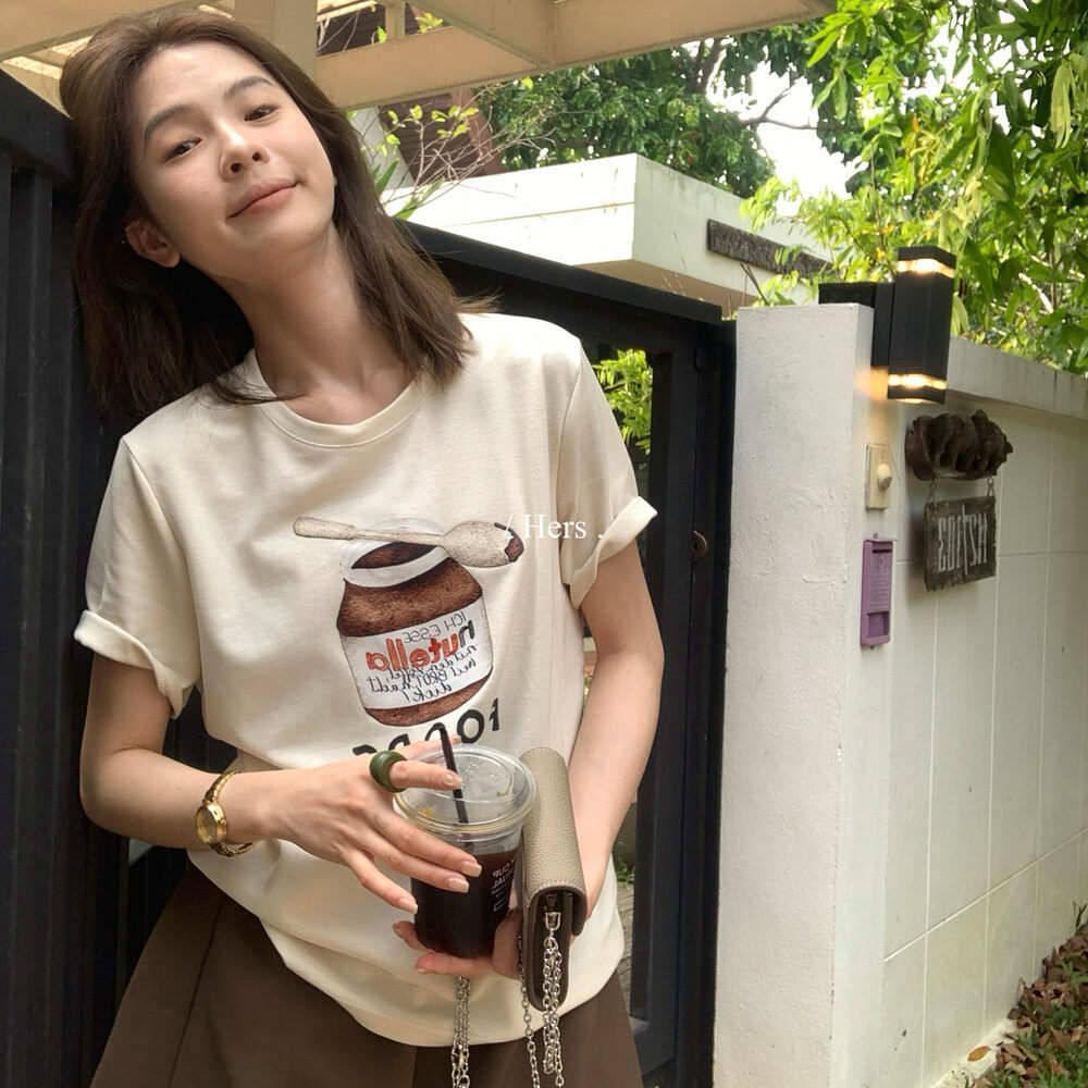 Áo thun nữ cổ tròn in họa tiết sô-cô-la hoạt hình, phong cách Hàn Quốc, form rộng suông — trắng ngà, màu xám, màu mơ