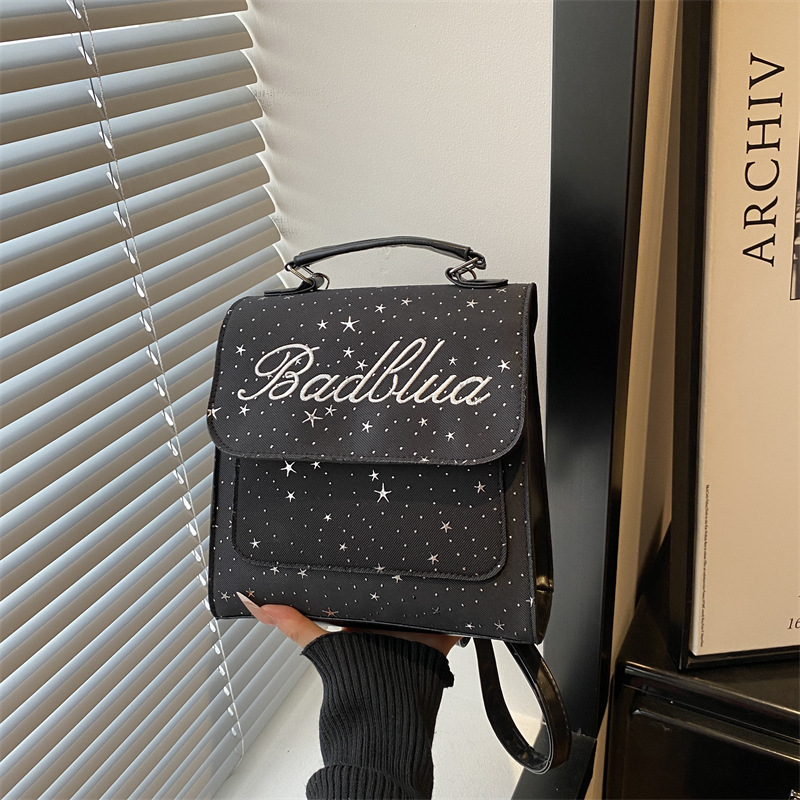 Mochila de moda coreana 2026 nuevo estilo coreano estilo académico letras versátiles bolso de hombro de mano
