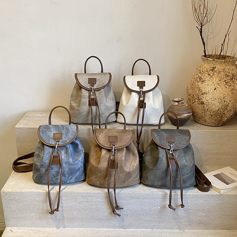 Gran capacidad de viento británico 2025, simple otoño nuevo estilo de textura casual de moda viaje viaje viaje mochila