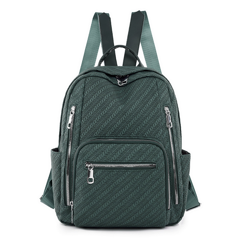 Ventas directas de fábrica 2024 primavera nueva mochila simple de color sólido para mujer mochila de viaje de gran capacidad para viajeros urbanos