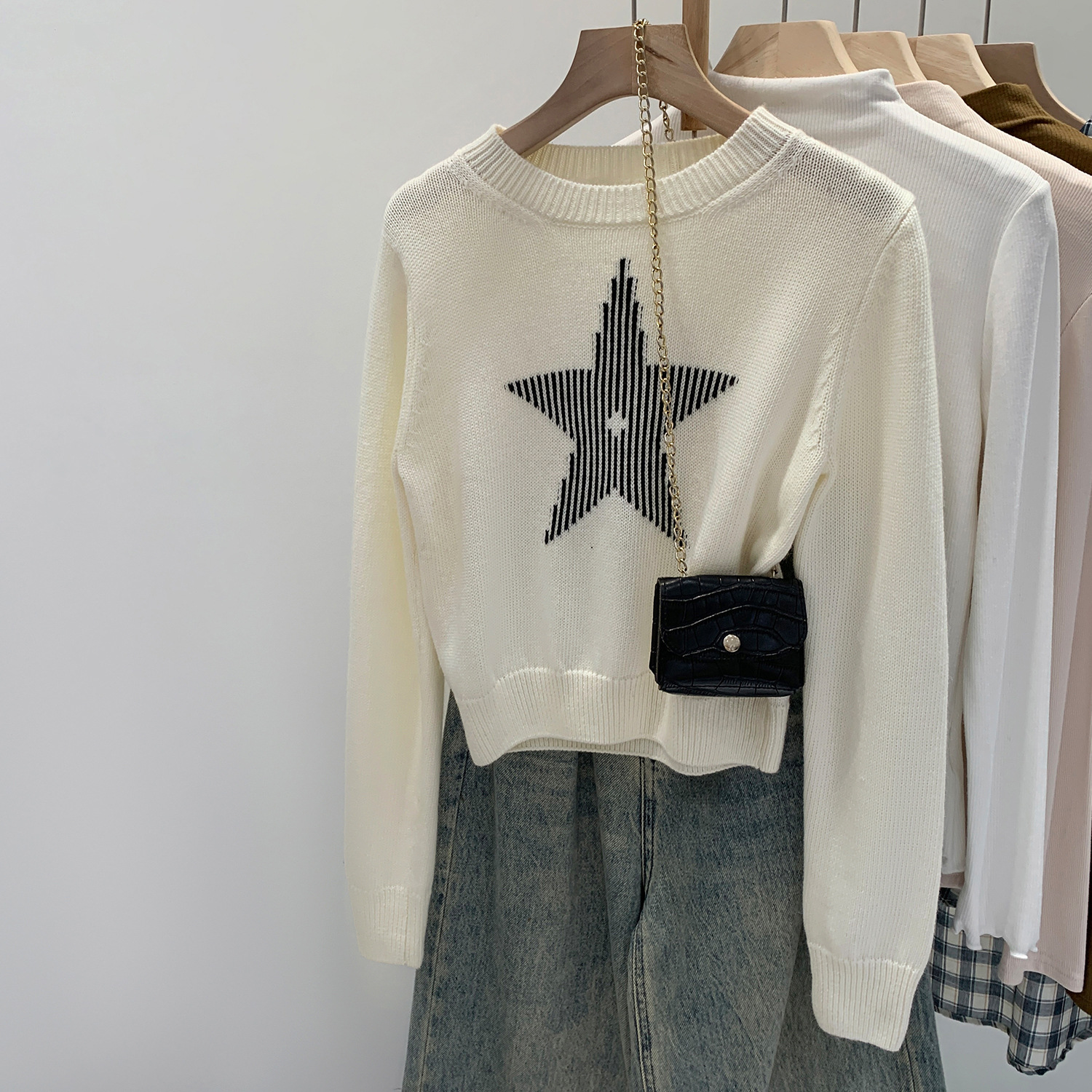 慵懒设计感星星印花圆领套头毛衣女装2025秋季新款宽松长袖针织衫