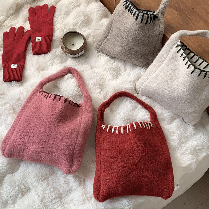 Bolsas de punto otoño y invierno nueva atmósfera bolsas de cesta de verduras bolsas de tejido a mano bolsas de lana de moda bolsas de hombro