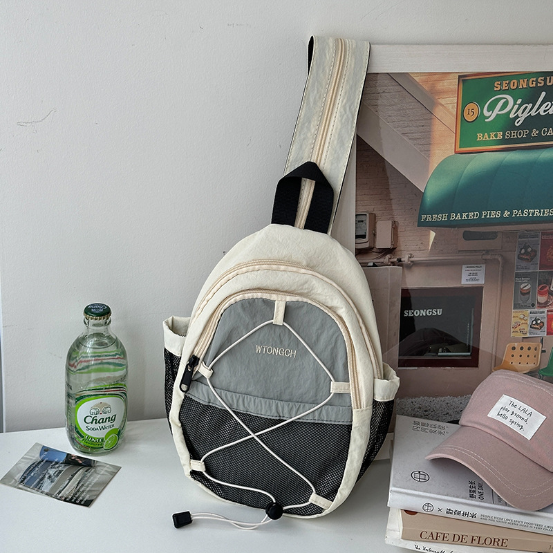 Mochila coreana para niños y niñas, estilo extranjero, bolsas escolares de color contrastante, nueva mochila multifuncional para niños.