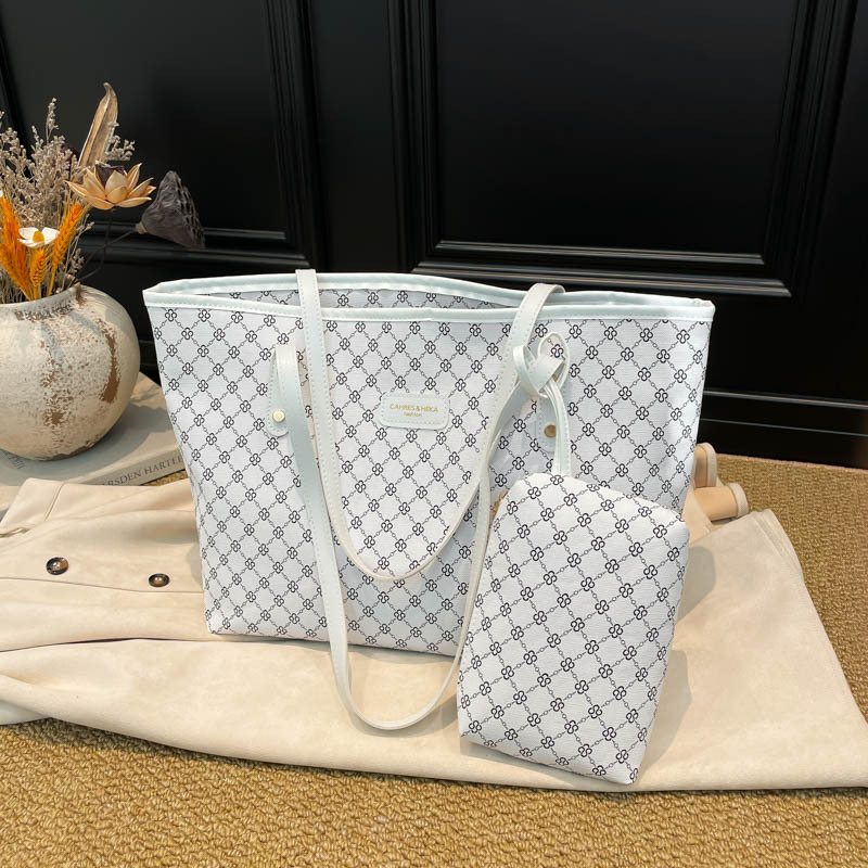 Tendencia transfronteriza coreana bolso de mano bolso de mujer 2025 nuevo invierno estriado bolso de hombro ligero de lujo bolso de brazos