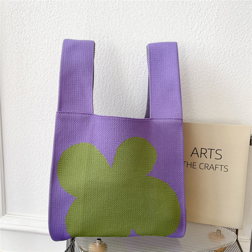 New flower niche knitted handbag for women in spring, autumn and summer travel knitted fashionable versatile personalized casual trendy bag