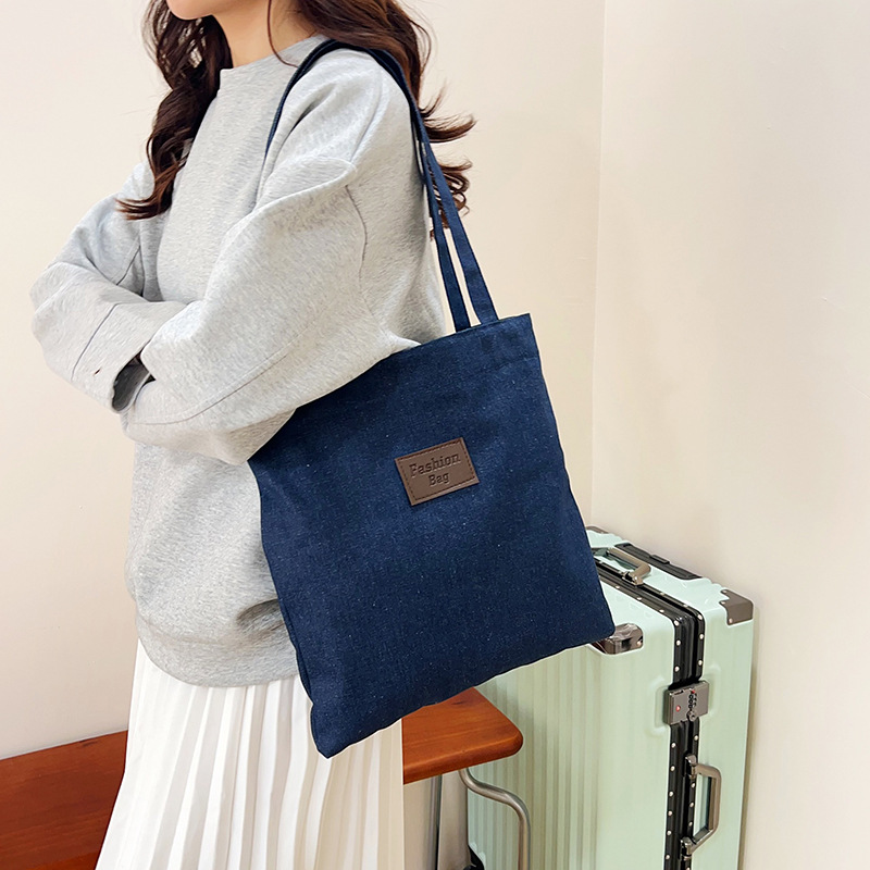 Bolso de lona de mezclilla retro ins bolso de hombro de gran capacidad para estudiantes que viajan a clase bolso de todo fósforo primavera