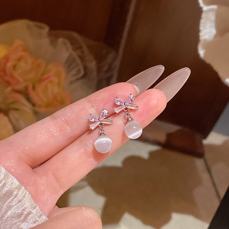 女性用の絶妙なリボンジルコンイヤリング、軽くて豪華なニッチハイエンドキャッツアイペンダントイヤリング、インターネットセレブと同じスタイルのイヤリング|undefined