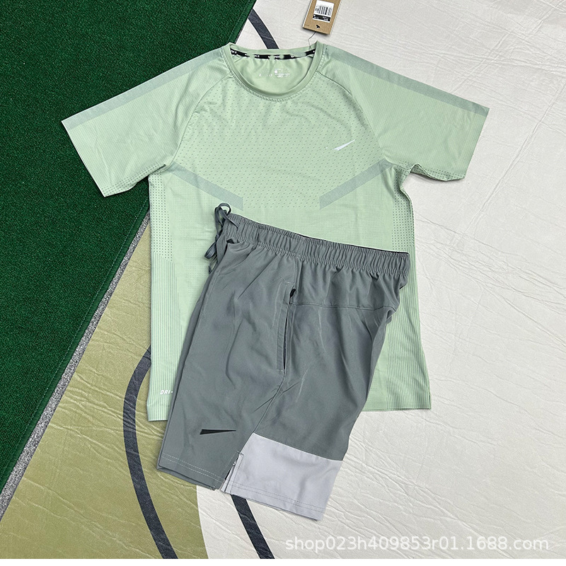 Nuevo al por mayor movimiento de secado rápido transpirable hombre camiseta de manga corta entrenamiento de hielo suelta chaqueta casual fitness correr