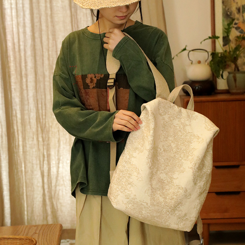 文艺棉麻双肩包女新款小众高级感轻便旅游背包大容量通勤布包