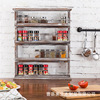 Multi -layer salt sauce vinegar jar on the wooden wall storage racks of retro flavors classification frames