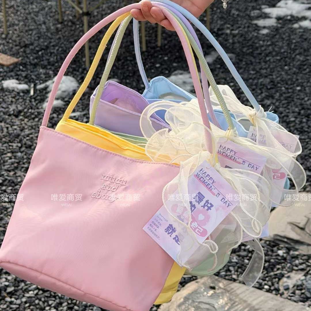 Bolsa de mano de estilo coreano de alto nivel, bolsas de mano de nicho de lujo ligeras, bolsas de actividades de apertura de belleza, bolsas de regalo prácticas para clientes