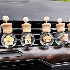 Air outlet car aromatherapy bottle cartoon cute perfume bottle doll internet celebrity same style milk tea color car interior decoration