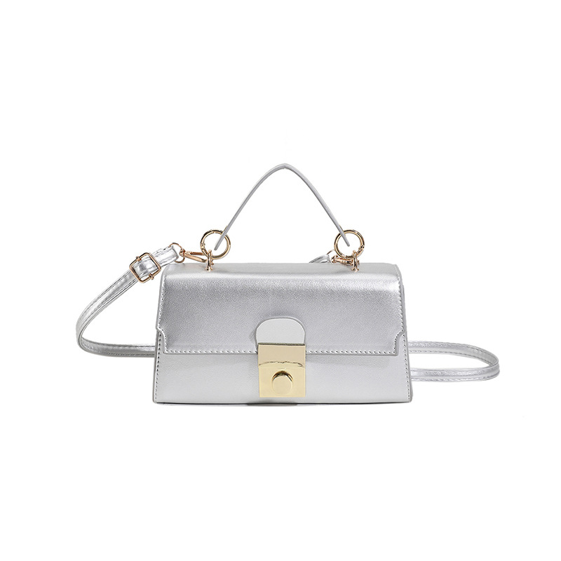 2025 primavera nuevo temperamento diseño de moda estilo extranjero textura simple mochila de hombro bolso de bloqueo de mano color caramelo