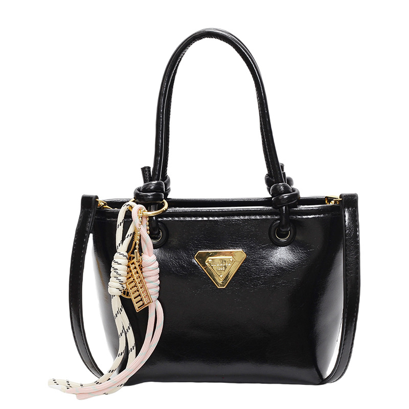 Bolso de mano simple de estilo extranjero para mujeres 2025, nuevo bolso de cubo de alta calidad, bolso de hombro casual simple