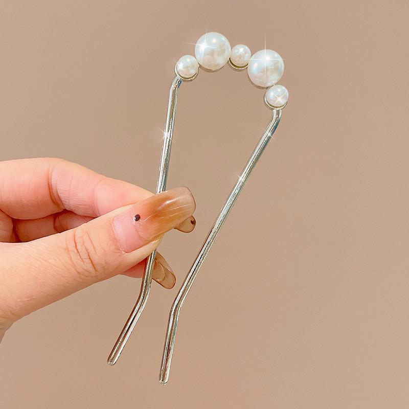 Temperamento en forma de U pinzas de pelo japonesas y coreanas 2025 nuevo simple pinzas de cabello de cabeza de cabeza de bola de cabeza de cabello de cabello